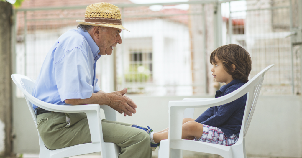 Old man advising a child
